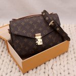 Pochette Métis en toile monogram - Louis Vuitton Dressingment Votre