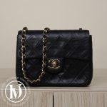 Sac mini timeless en cuir matelassé noir - Chanel Dressingment Votre