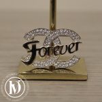Broche CC Forever en métal doré et strass - Chanel Dressingment Votre