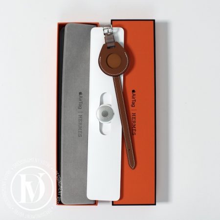 Porte-clé Apple AirTag en cuir gold - Hermès Dressingment Votre
