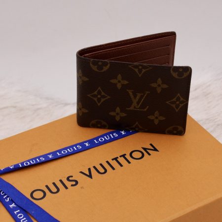 Portefeuille 2 volets en toile monogram - Louis Vuitton Dressingment Votre