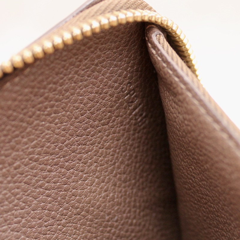 Portefeuille Secret Long en cuir monogram empreinte ombre - Louis Vuitton