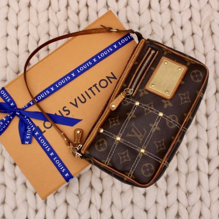 Pochette Riveting en toile monogram - Louis Vuitton Dressingment Votre