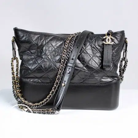 Sac Gabrielle médium en cuir matelassé noir - Chanel Sac Gabrielle médium en cuir matelassé noir - Chanel Dressingment Votre