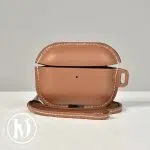 Étui pour Airpods en cuir swift gold - Hermès Dressingment Votre