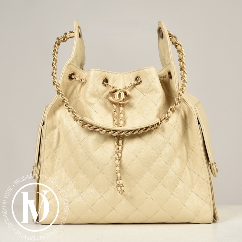 Sac Chanel 25 médium cuir caviar beige - Chanel Dressingment Votre