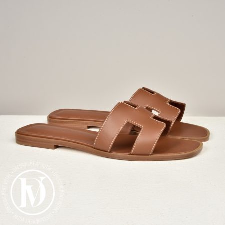 Mules Oran en cuir gold p.37 - Hermès